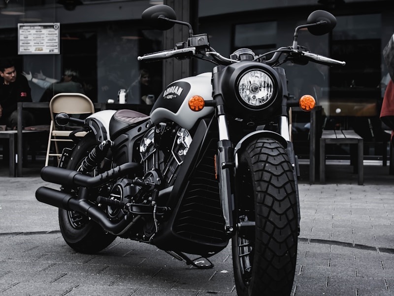 white and black BMW cruiser motorcycle on road